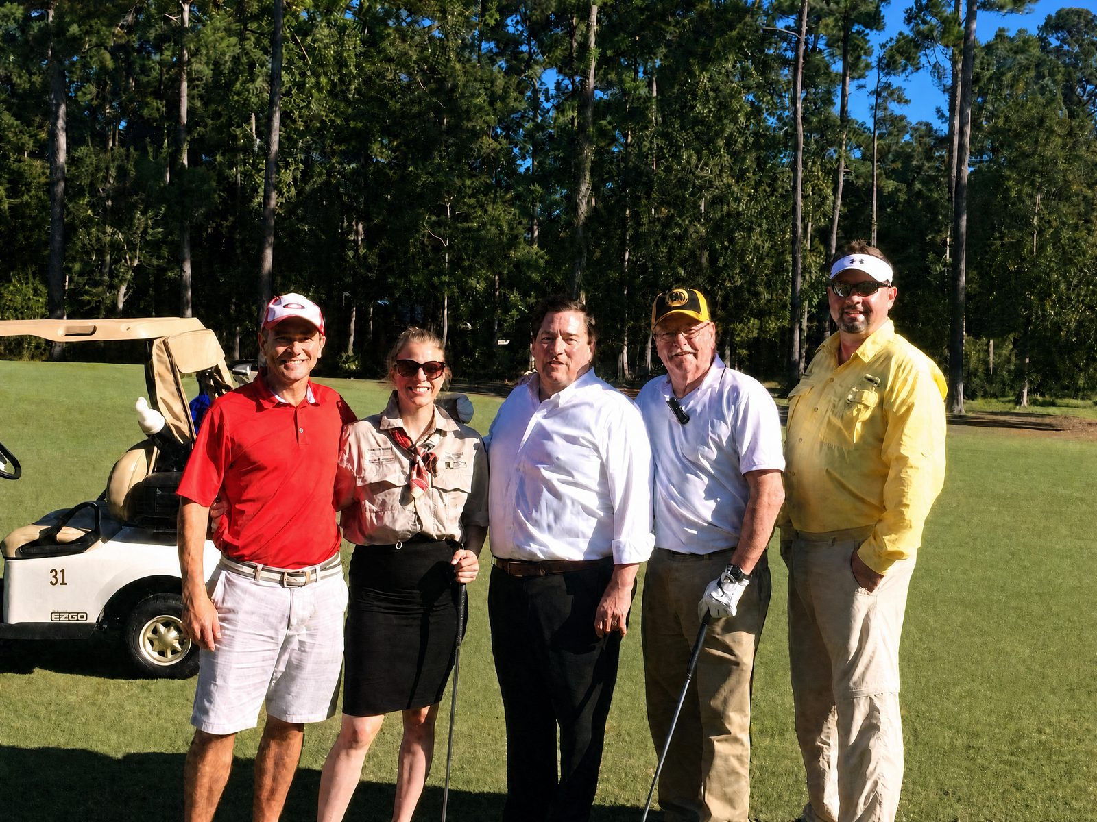 Billy Nungesser with a foursome on the course